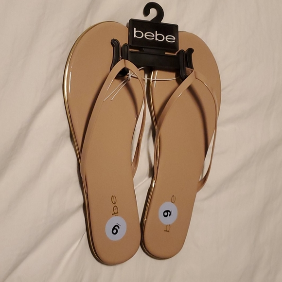 bebe Shoes - BeBe beige and gold flip flops